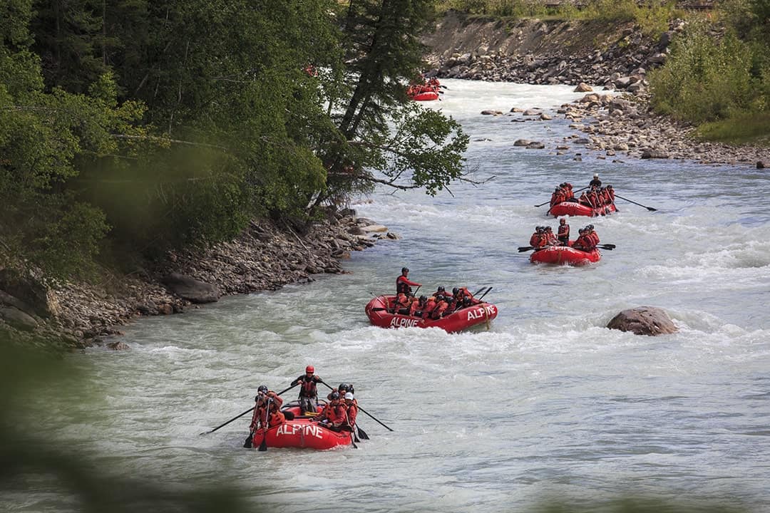 5 boats rafting the Kicking Horse River in Golden BC